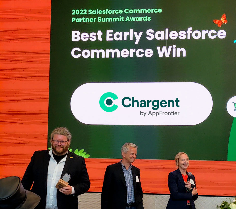 Micaiah Filkins accepts award at 2022 Salesforce Commerce Partner Summit Awards ceremony