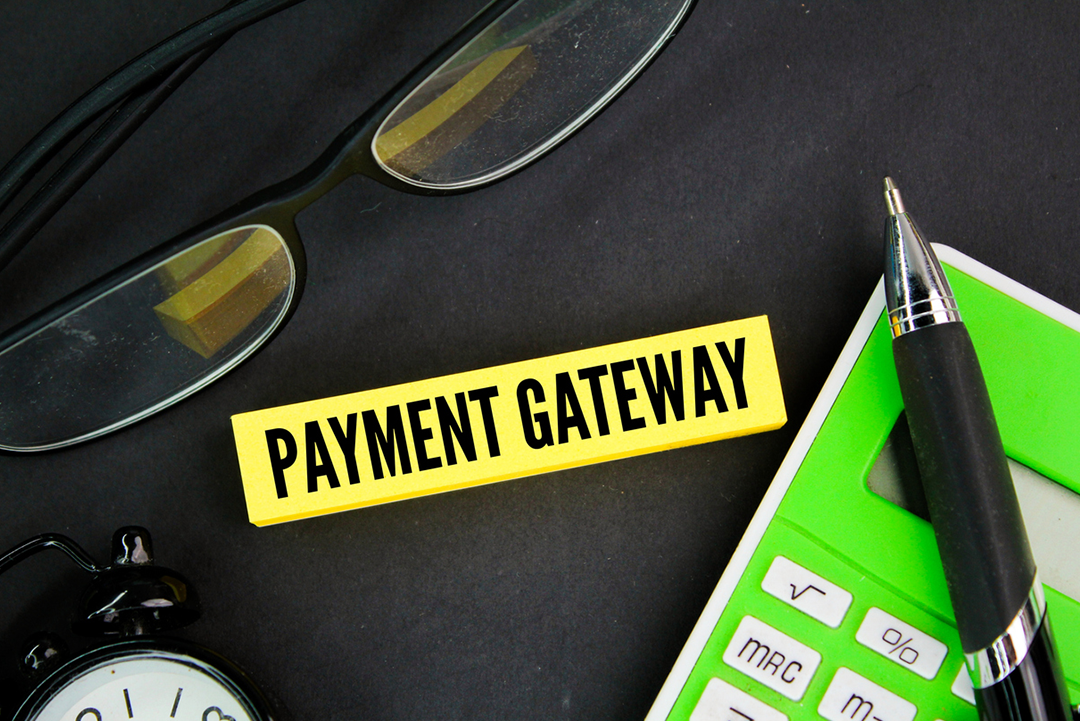 Payment gateway sign, calculator, and glasses.