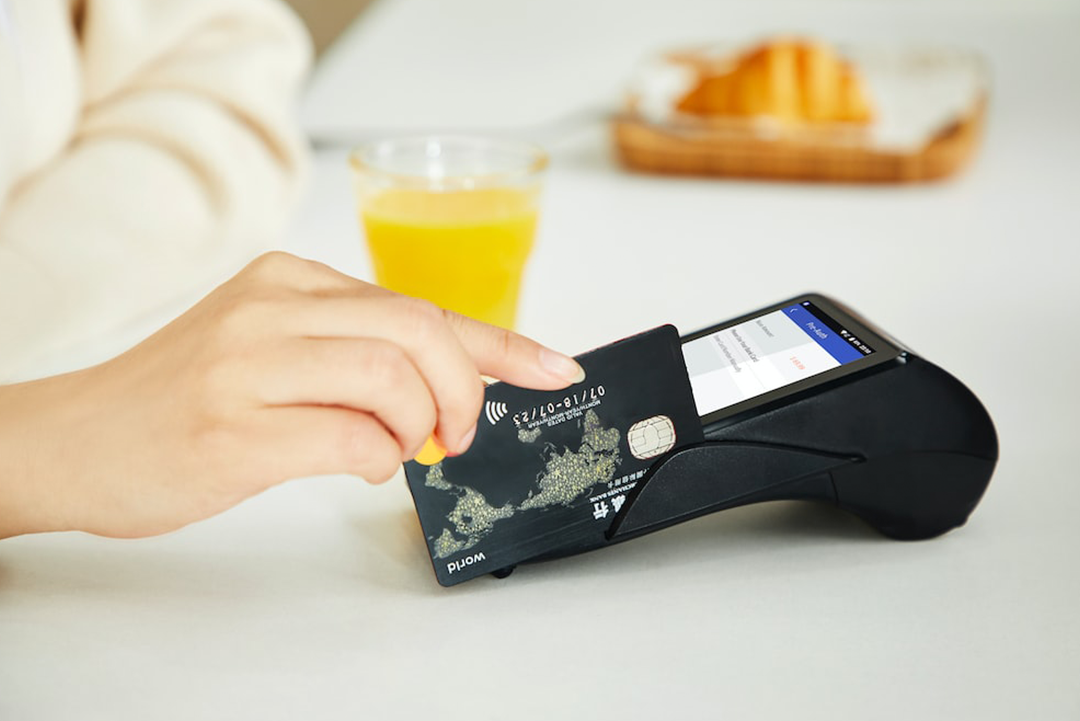 Customer swiping their credit card.